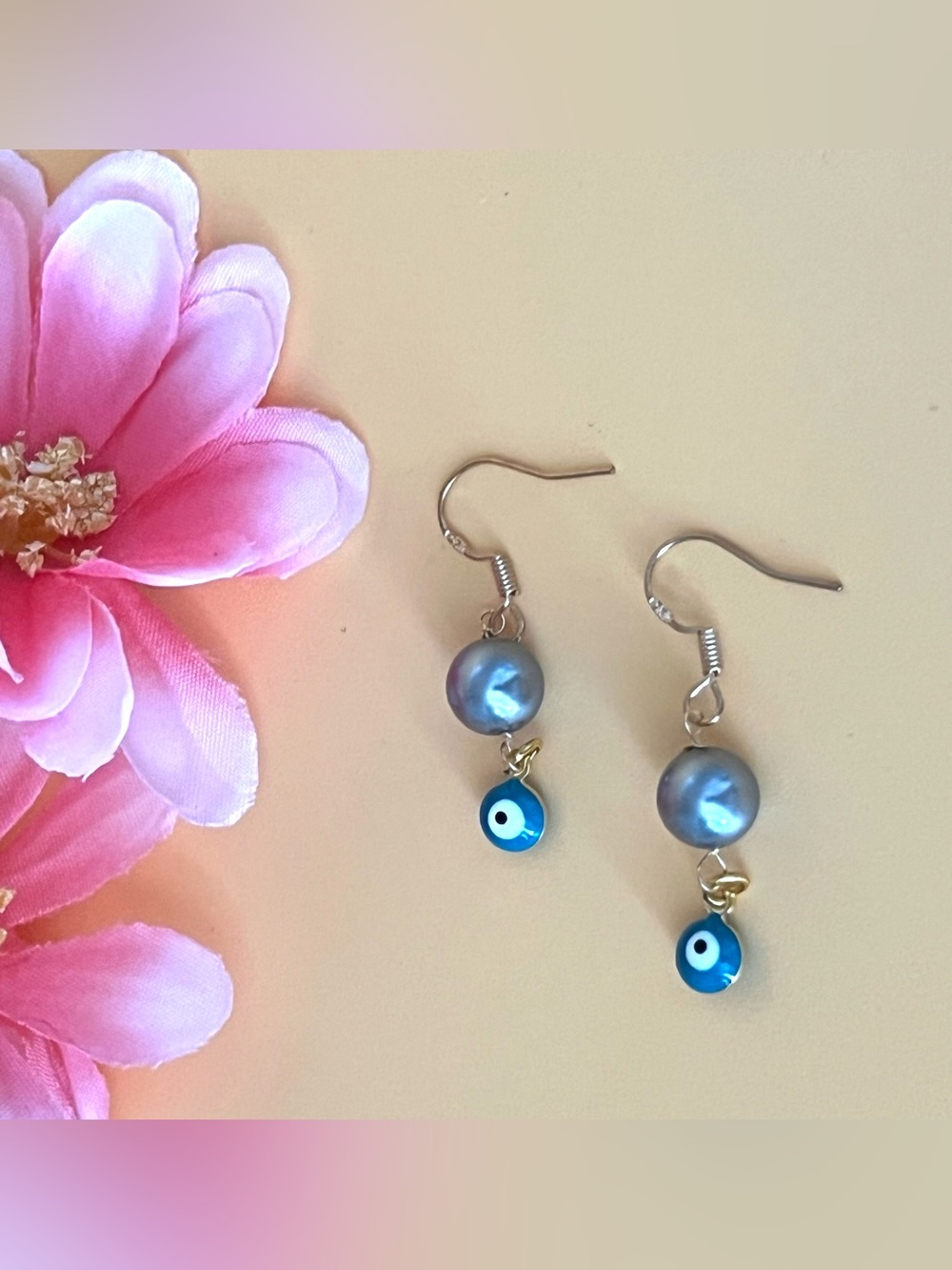Gold plated and Black faux pearl Earrings with Turquoise evil eyes Accent